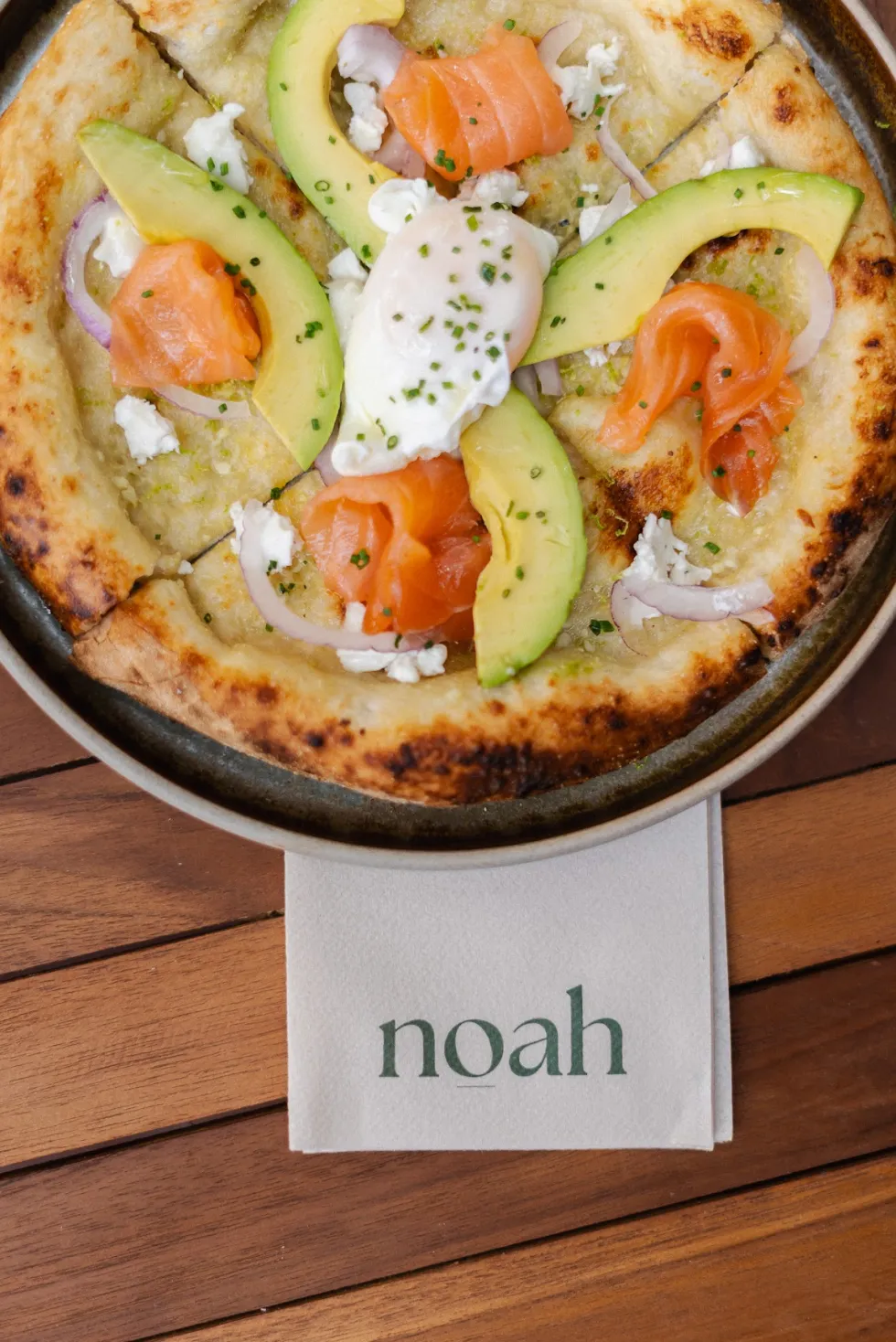 Smoked trout breakfast pizzette with crème fraîche at Noah Cape Town